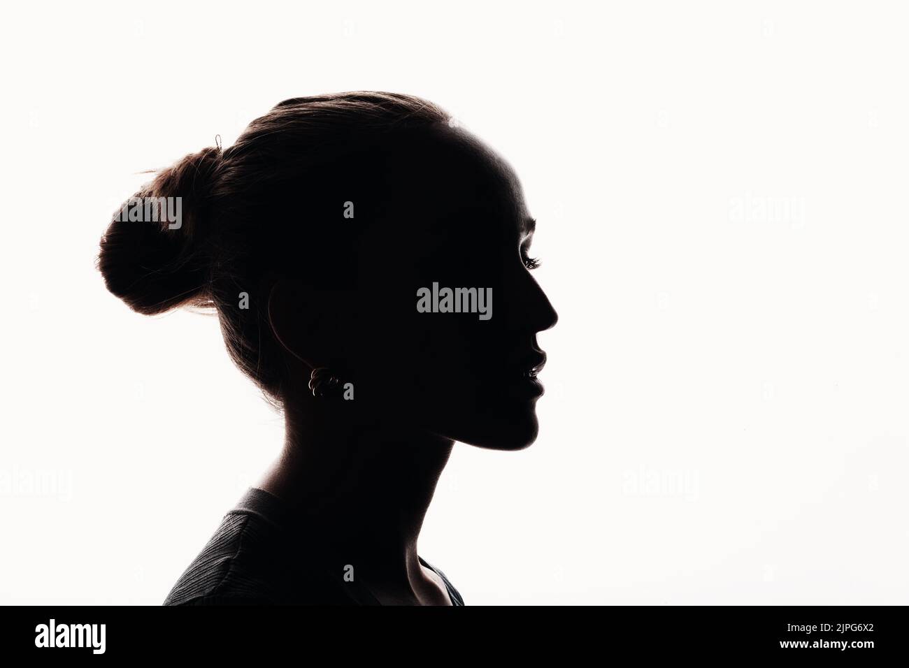 sad woman profile silhouette on black background looking down Stock Photo -  Alamy
