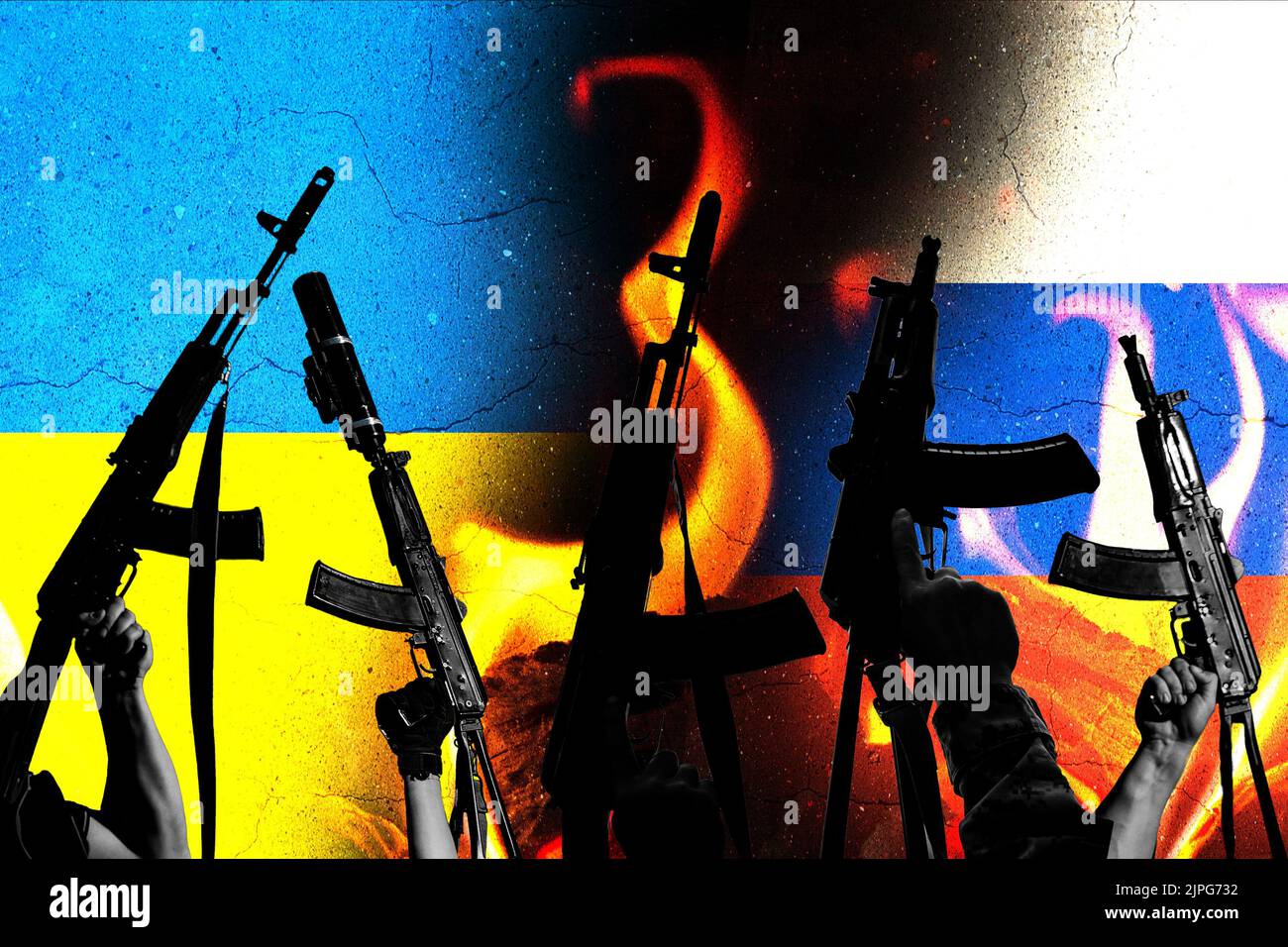 Two enemy flags and combat military assault rifles AK 74 and AK 74U on their background in destruction and fire. Stock Photo