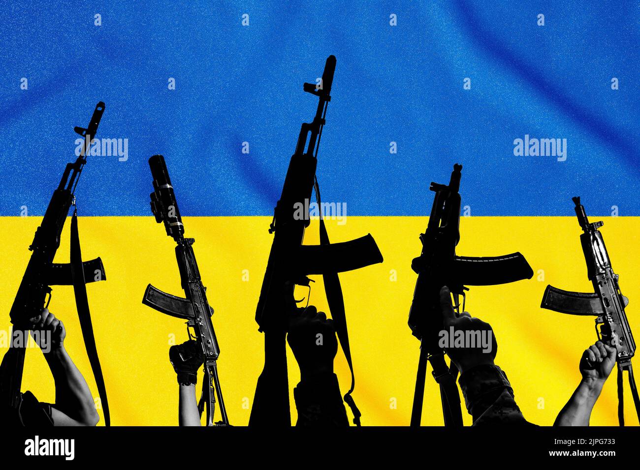 The flag of Ukraine and combat military assault rifles AK 74 and AK 74U on its background, war and destruction, the country was attacked. Stock Photo