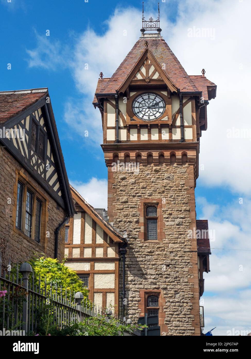 Barrett Browning Institute clock tower and almshouses in foreground at Ledbury Herefordshire England Stock Photo