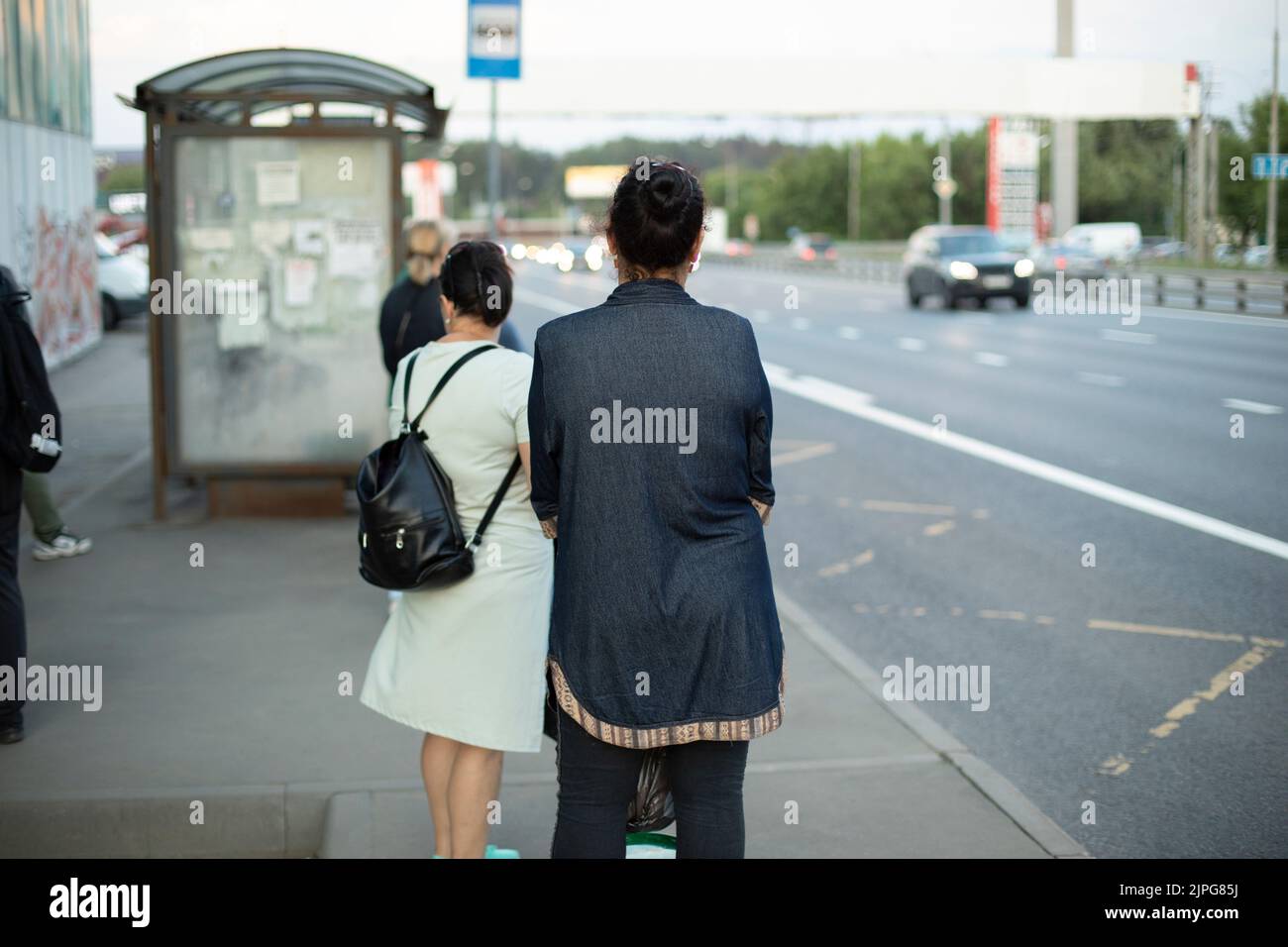 Black african woman waiting bus hi-res stock photography and images - Alamy