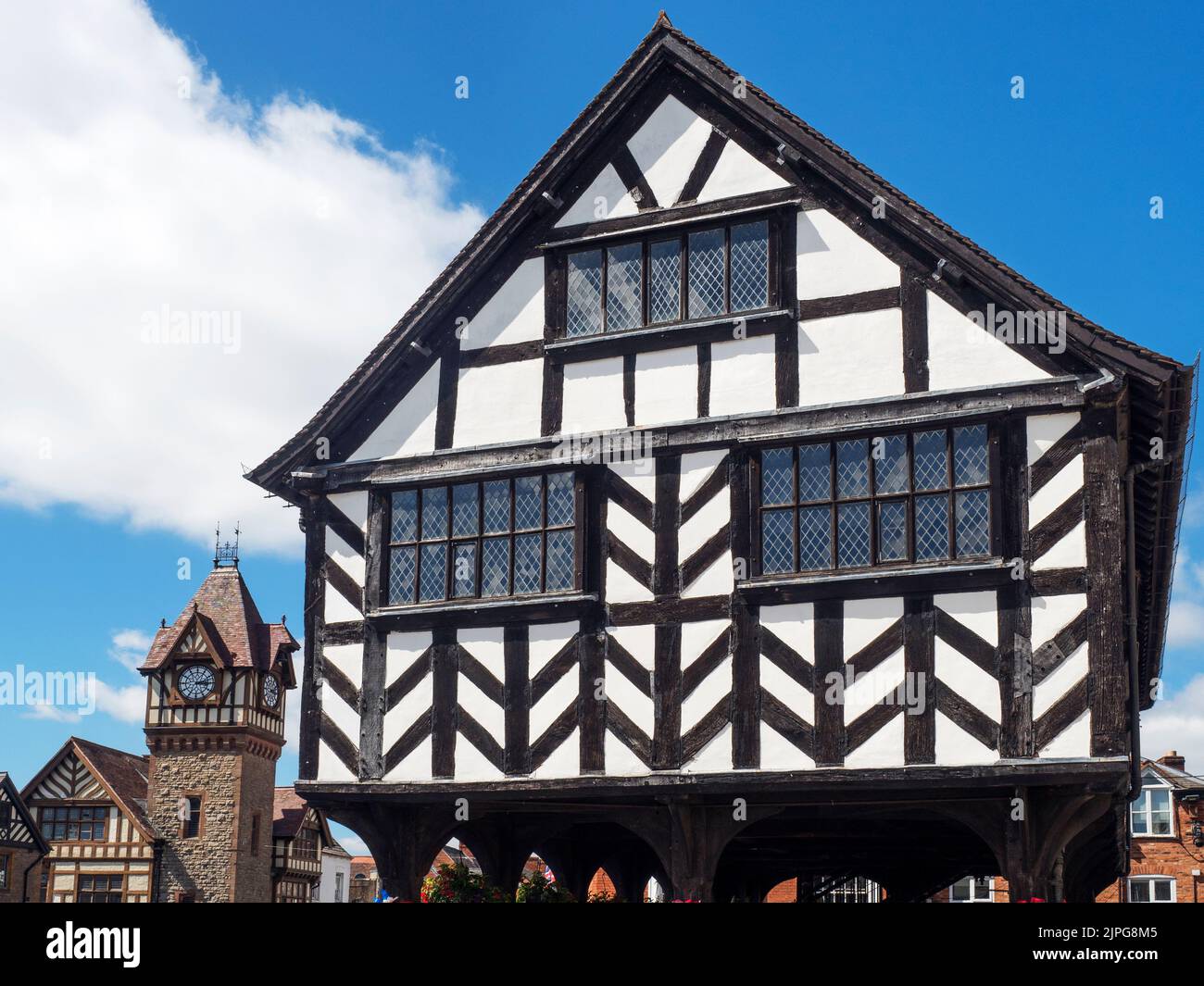 The Market House with Barrett Browning Institute behind on the High Street at Ledbury Herefordshire England Stock Photo