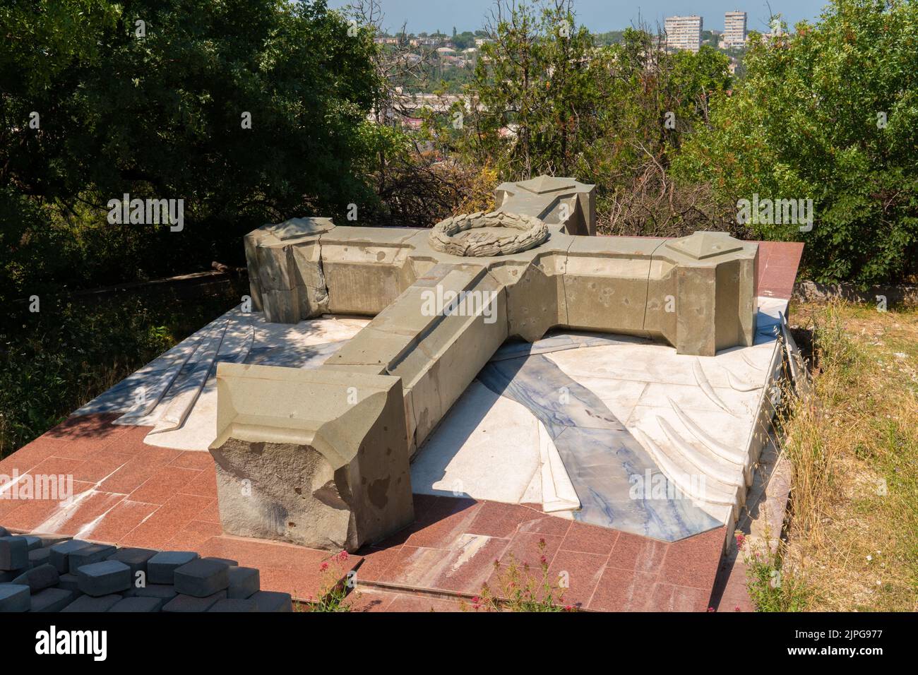 RUSSIA, CRIMEA - JUL 09, 2022: Nikolay Sevastopol cross Crimea Holy down broken christian old ground, from god religion in background for peace Stock Photo