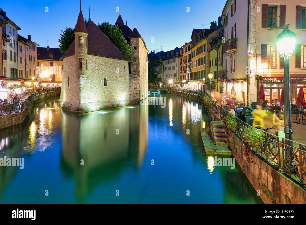 Annecy Haute Savoie France. The Palais de l'Isle and Thiou river at sunset Stock Photo