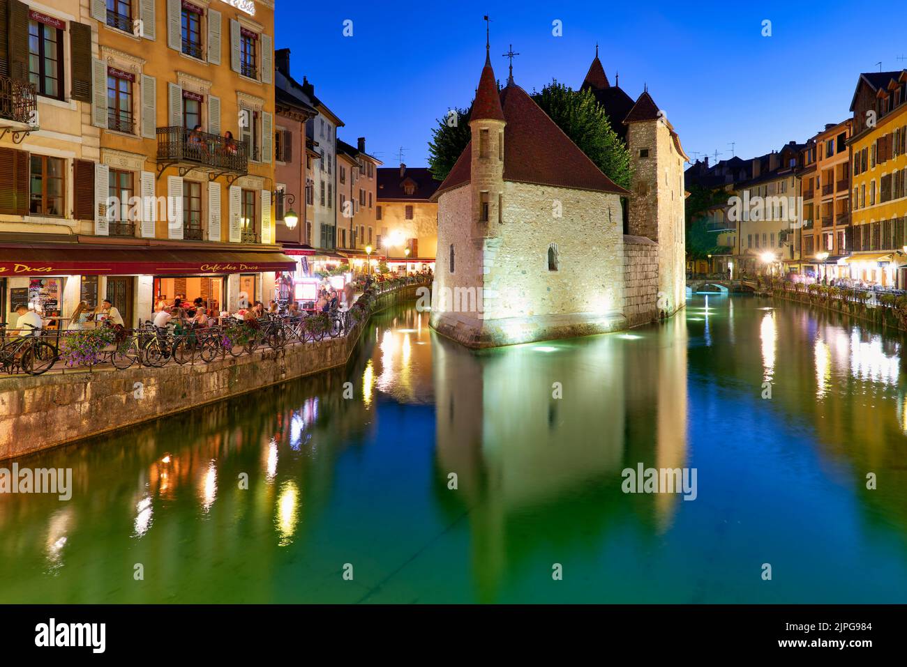 Annecy Haute Savoie France. The Palais de l'Isle and Thiou river at sunset Stock Photo