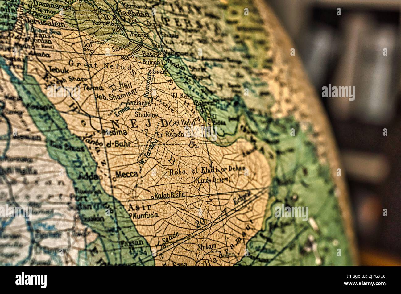 A map of Saudi Arabia / Nejd captured on an antique globe Stock Photo
