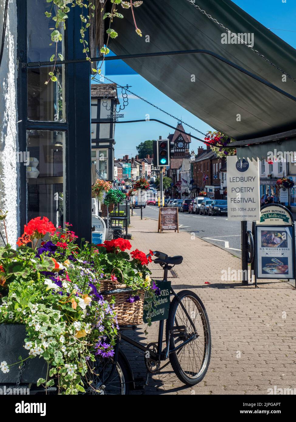 Looking along the High Street to the Barrett Browning Institute during the Poetry Festival Ledbury Herefordshire England Stock Photo