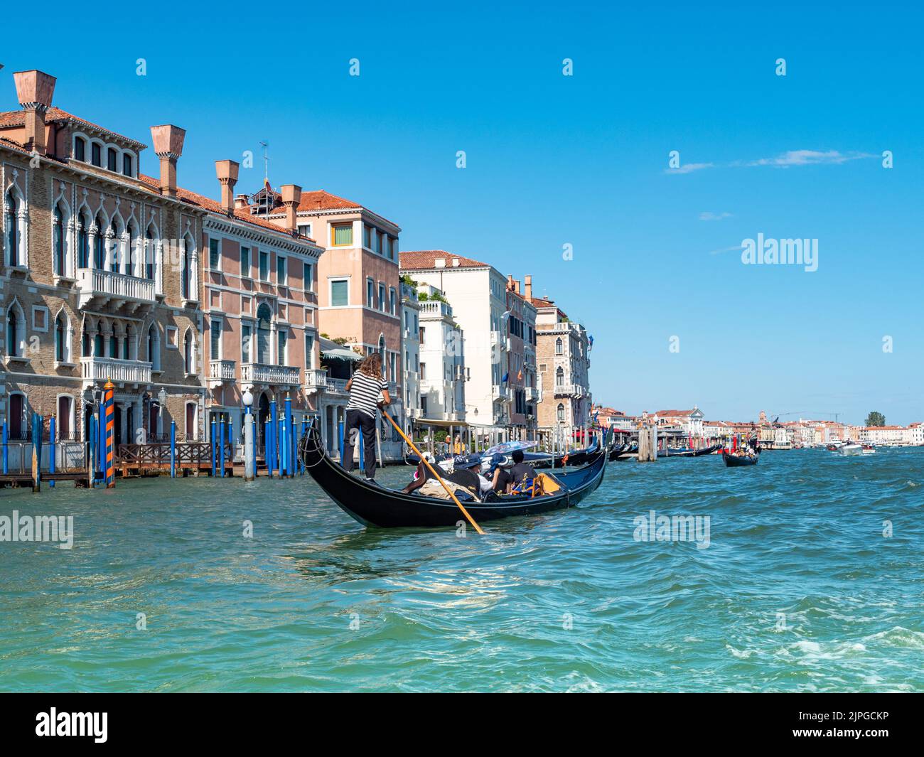 Romantic gondola ride in Venice Stock Photo - Alamy