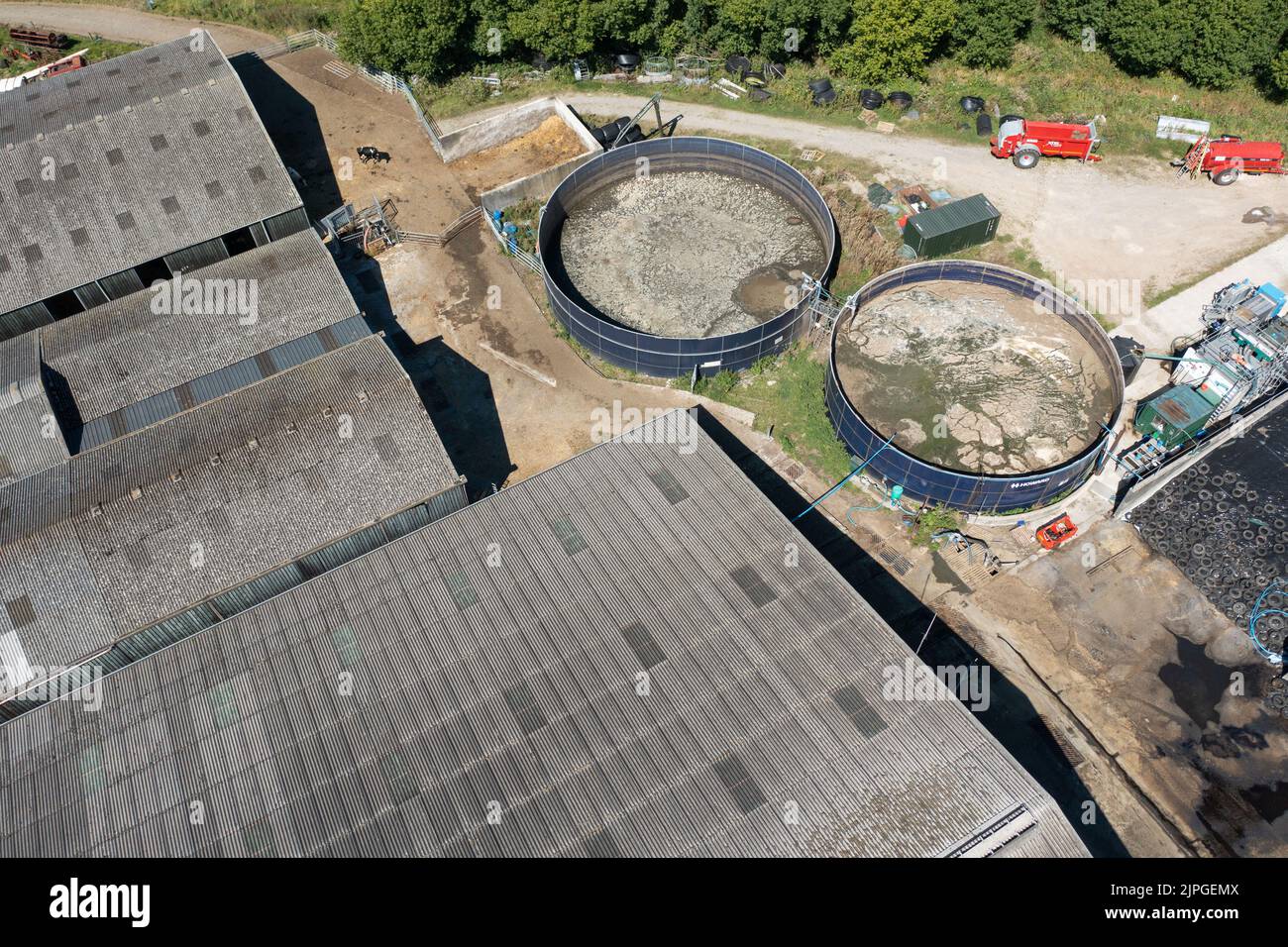 Aerial view of dairy farm showing slurry tanks, Towy Valley, Carmarthenshire, Wales, UK Stock Photo