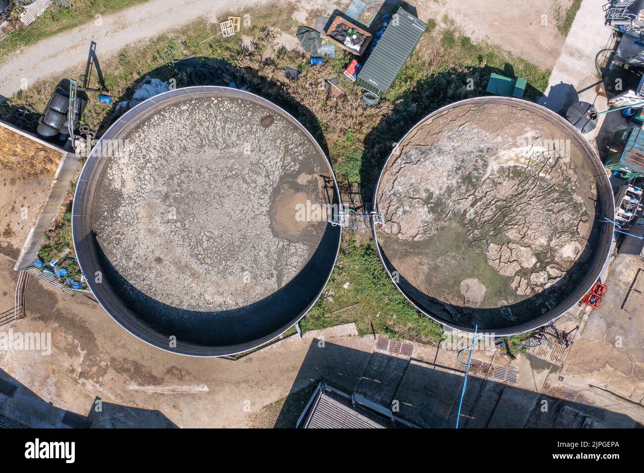 Aerial view of dairy farm showing slurry tanks, Towy Valley, Carmarthenshire, Wales, UK Stock Photo