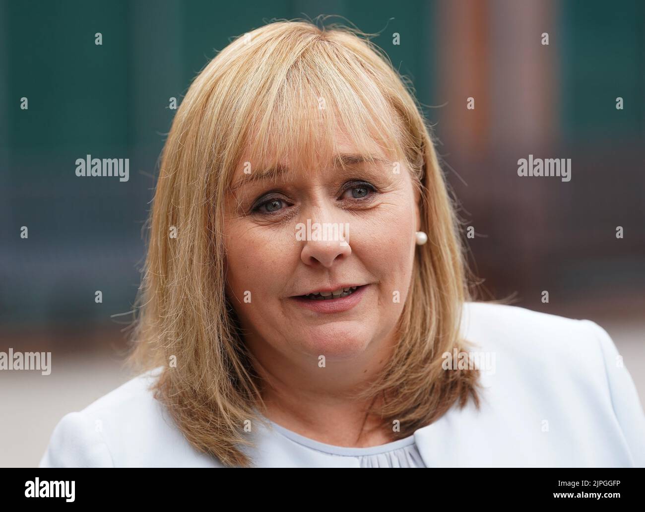 Education Minister Michelle McIlveen speaking to the media at Strathearn Grammar School in east Belfast where she met with some of the past pupils receiving their A-level results. Picture date: Thursday August 18, 2022. Stock Photo