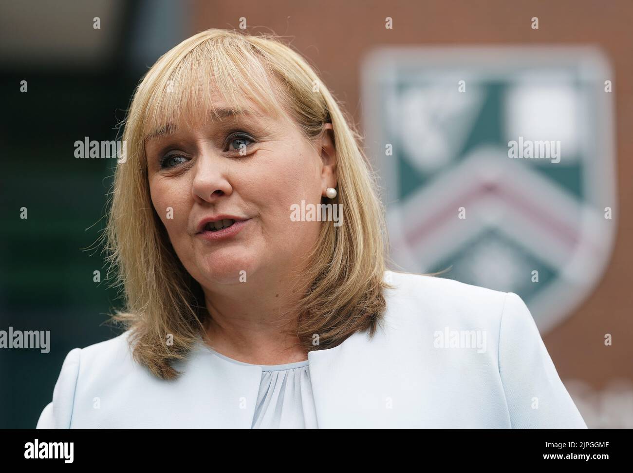 Education Minister Michelle McIlveen speaking to the media at Strathearn Grammar School in east Belfast where she met with some of the past pupils receiving their A-level results. Picture date: Thursday August 18, 2022. Stock Photo