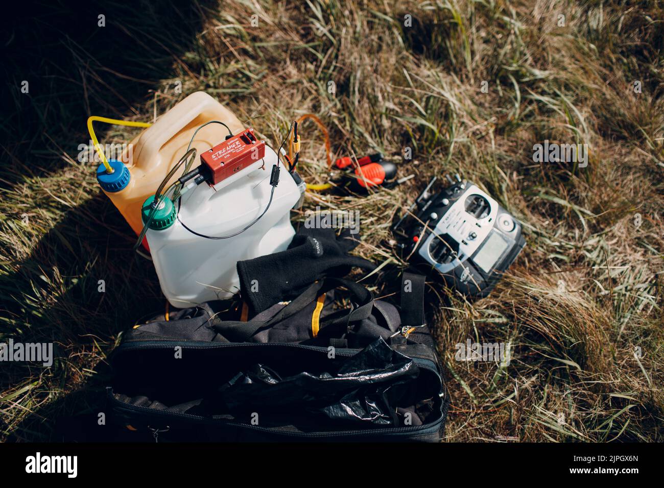Fuel gas and parts stuff for Radio control rc airplane toy model on ground. Stock Photo