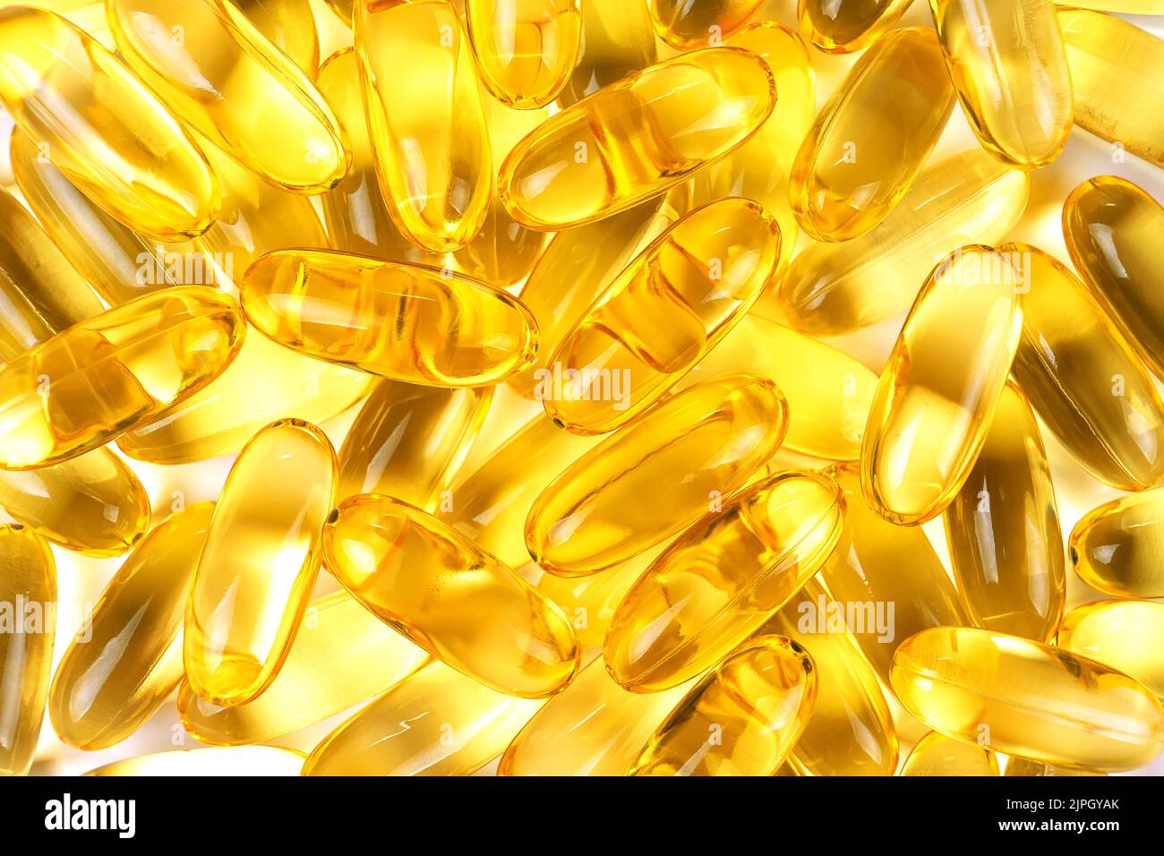 Omega 3 fish oil supplement softgel capsules background. Health care