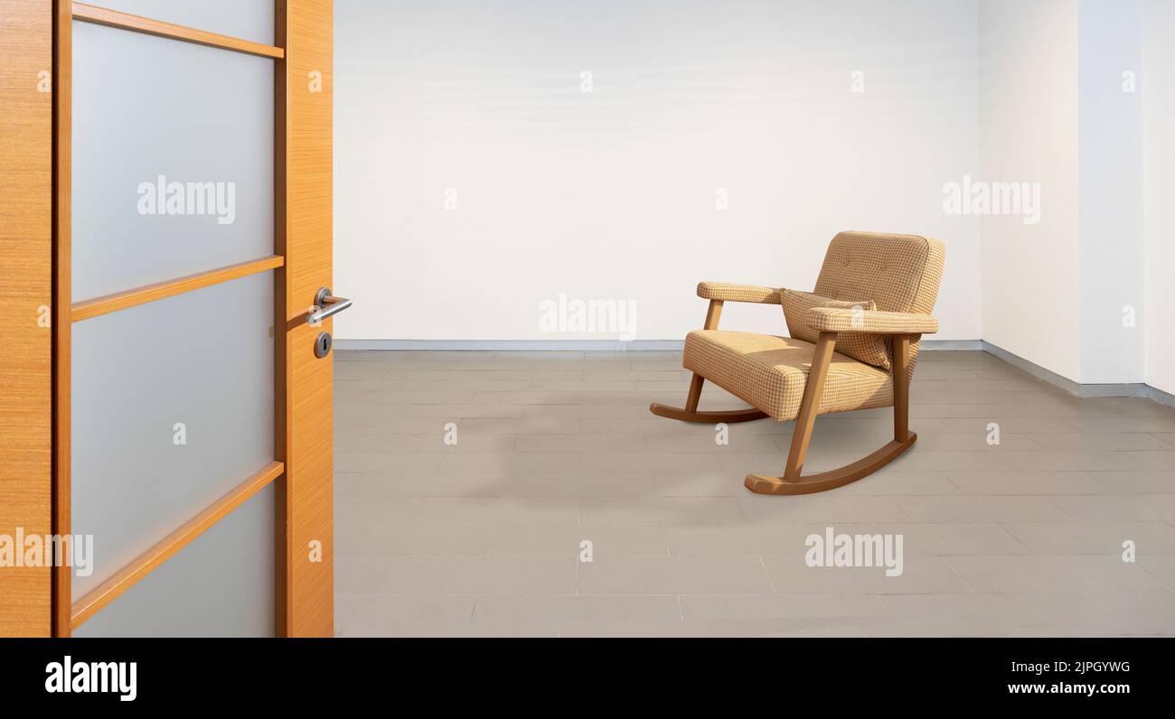 Empty Room Rocking Chair An empty room with a rocking armchair on the wooden floor Stock Photo ...