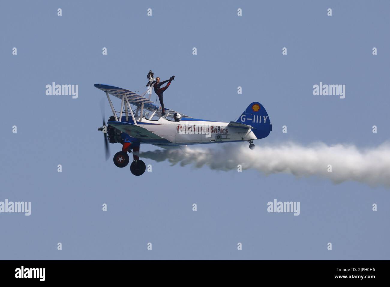 Eastbourne, UK. 18th Aug 2022. UK weather. The Aerosuperbatics wingwalkers perform on the first day of this years Eastbourne Airshow. Credit:Ed Brown/Alamy Live News Stock Photo