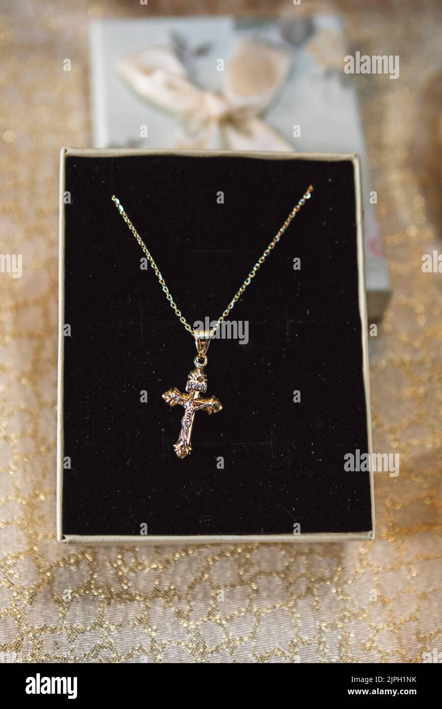 a cross in a box in a church during baptism Stock Photo Alamy
