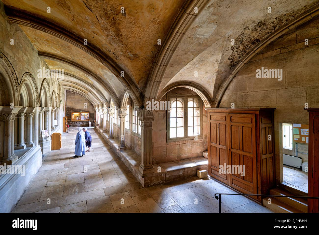 Vezelay Abbey. Bourgogne France. Nun in the cloister Stock Photo
