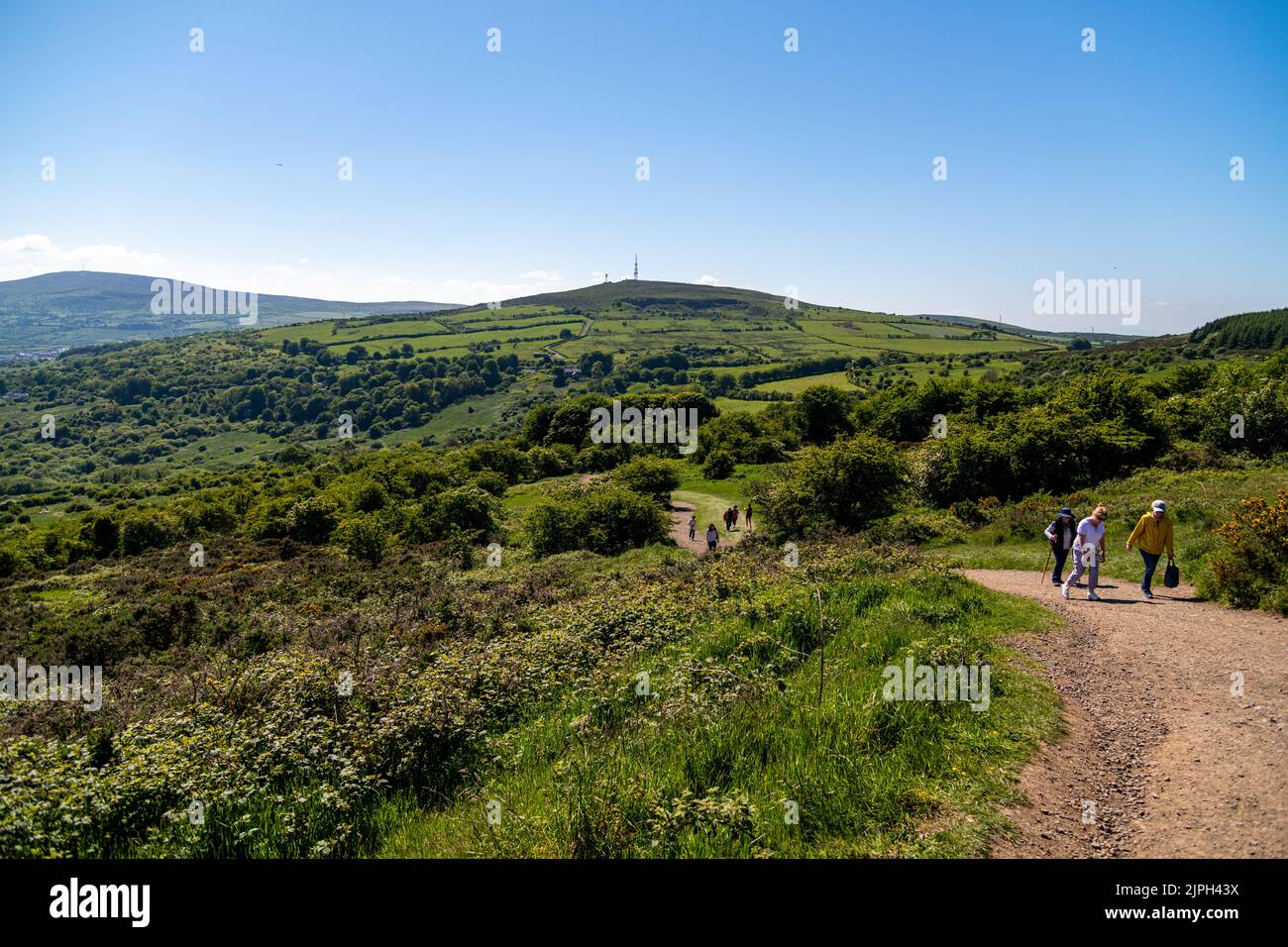 People walking up a trail at Cave Hill in Belfast, Northern Ireland Stock Photo