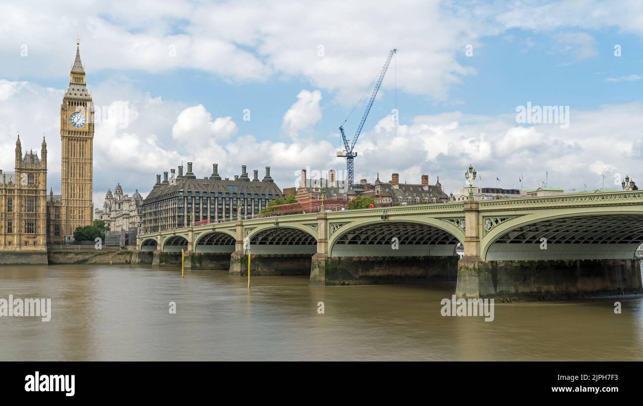 Houses of Parliament viewed from Westminster Bridge in London on a cloudy day Stock Photo