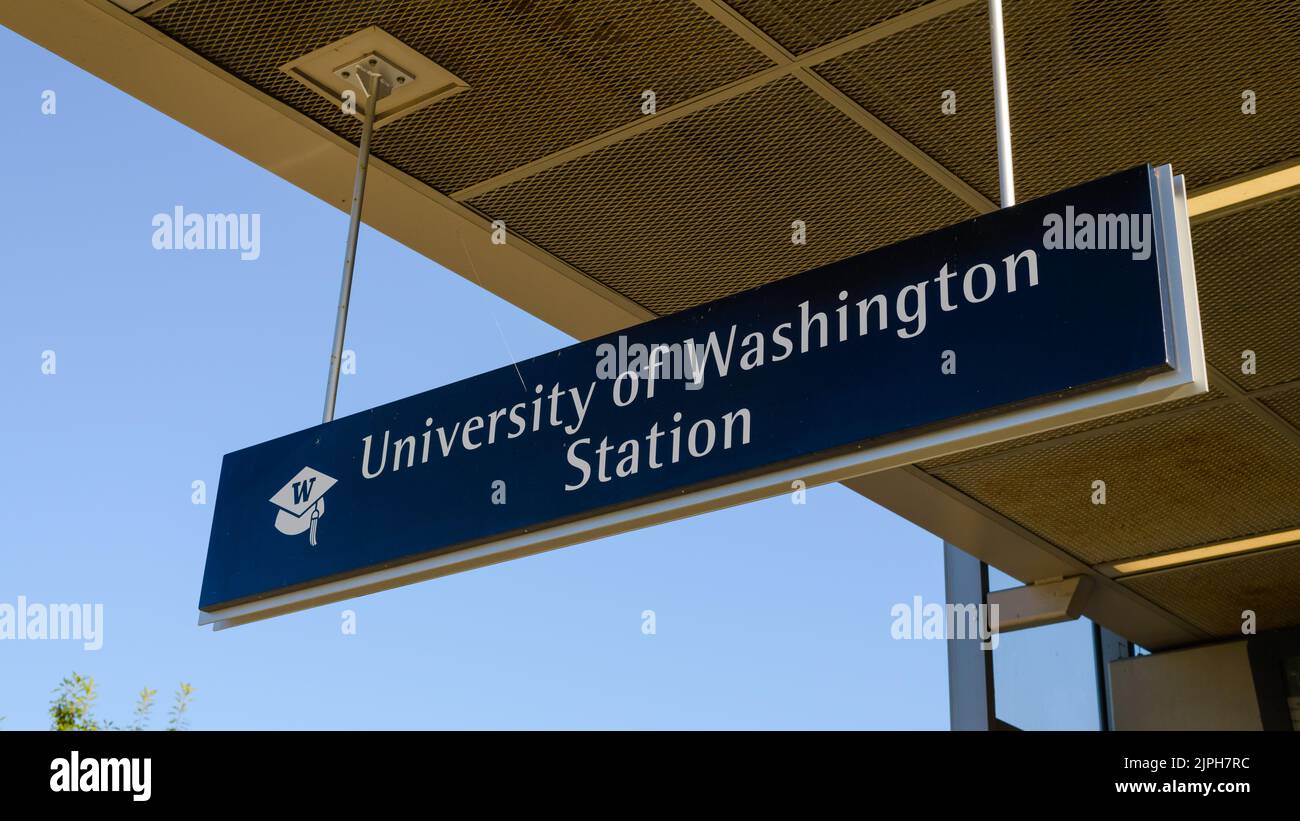 Seattle - August 14, 2022; Hanging sign for University of Washington light rail station in Seattle Stock Photo