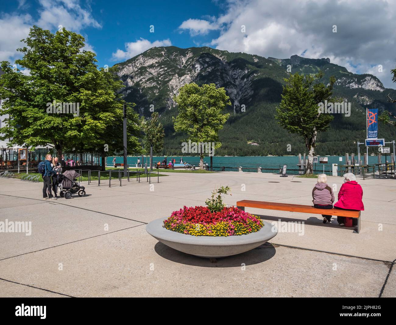 Picturesque Achensee in the Karwendel mountains of the Austrian Tirol seen here from the lakeside promenade at the resort town of Pertisau Stock Photo