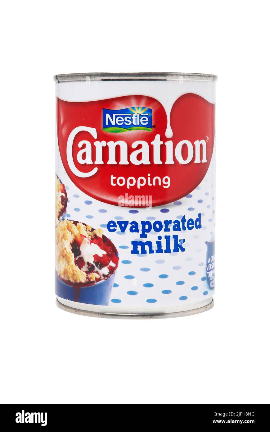 Can of Carnation evaporated milk. Studio shot isolated on white. Nestle is one of the largest food companies i Stock Photo