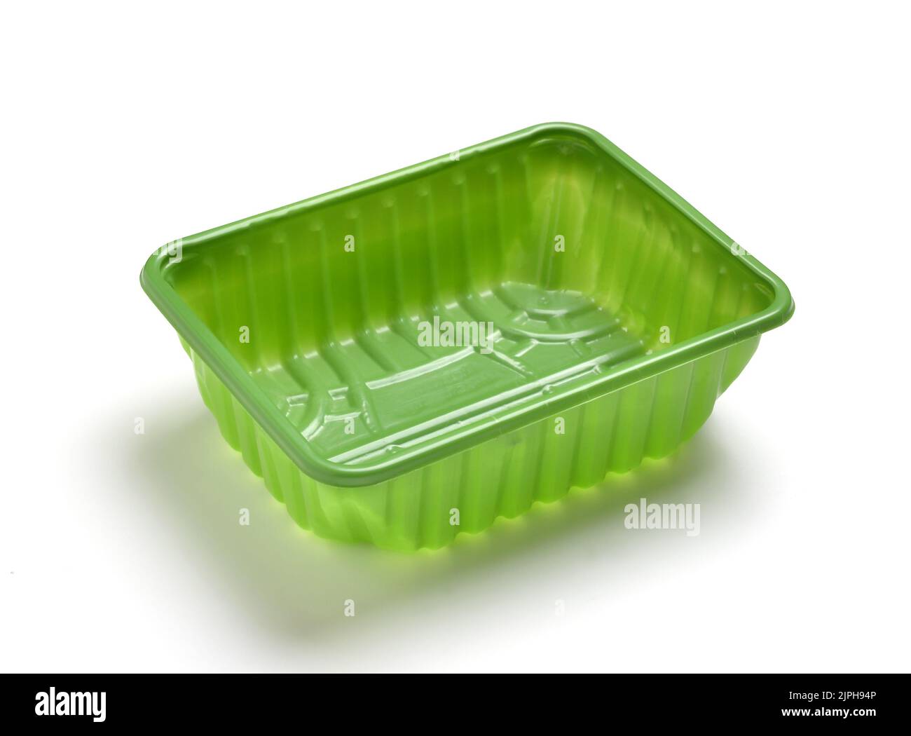 Green plastic recyclable fresh food retail tray container cut out on