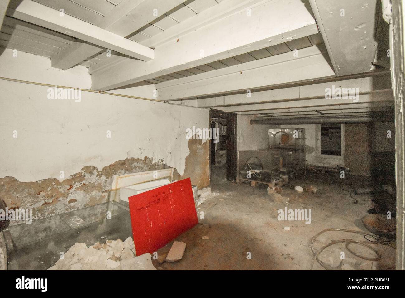 Boiler room of an apartment building with pipes and metering devices. A