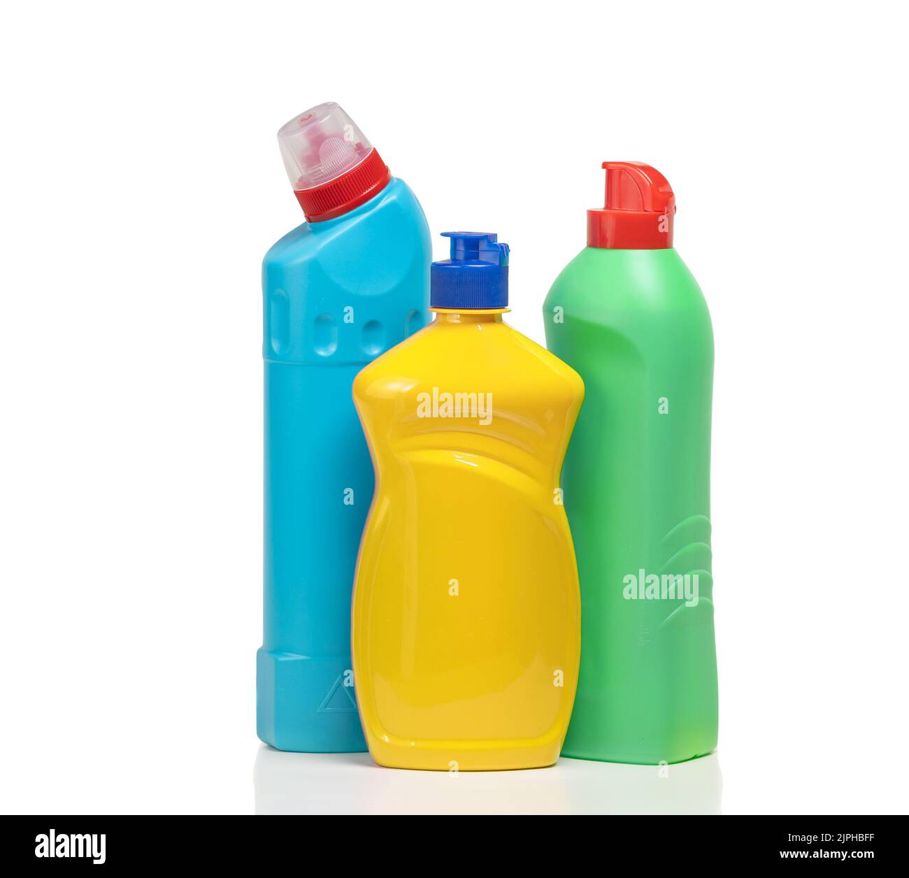 Household cleaning products in plastic bottles isolated on a white background. Colorful plastic bottles product mockup. Stock Photo