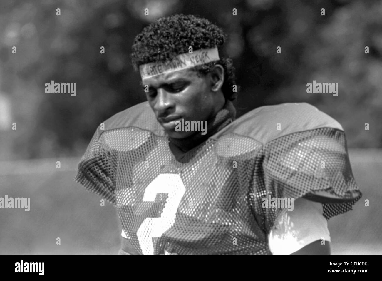 Deion Sanders at Florida State University in Tallahassee, Florida, c1988, where he played under head coach Bobby Bowden. Sanders, sometimes referred to as 'Prime Time' or 'Neon Deion', would later be inducted into the College Football Hall of Fame and the Pro Football Hall of Fame. A multi-sport athlete, he played for multiple teams in the National Football League (NFL) and Major League Baseball (MLB). Stock Photo