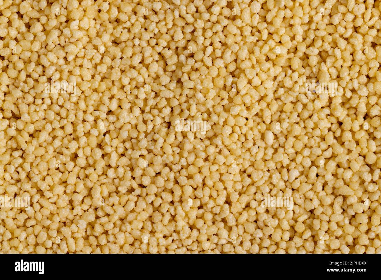 Fresh raw porridge couscous from wheat or millet, cooking dishes from traditional cereals of