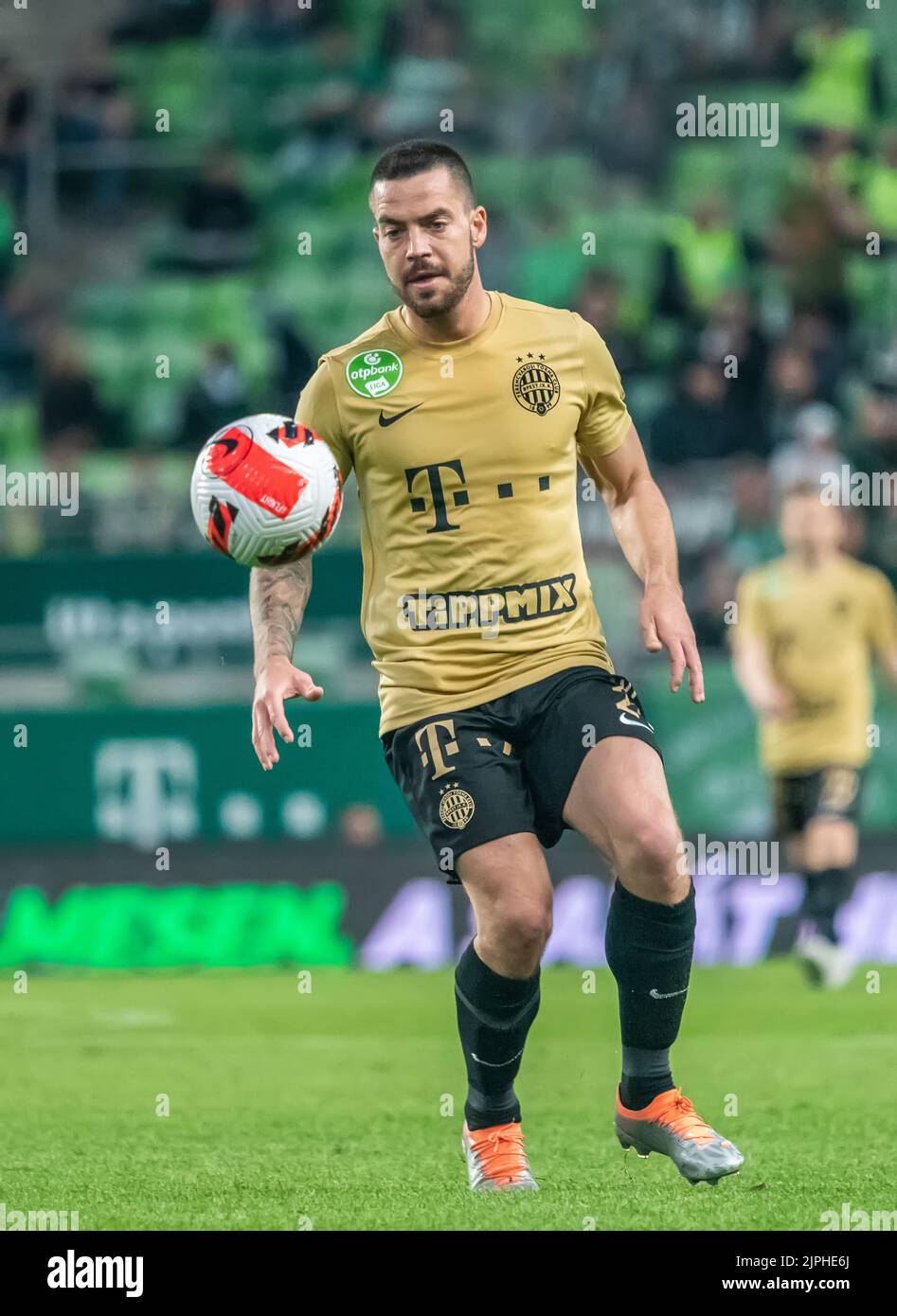 BUDAPEST, HUNGARY - MAY 11: Kristoffer Zachariassen of Ferencvarosi TC runs  with the ball during the Hungarian Cup Final match between Ferencvarosi TC  and Paksi FC at Puskas Arena on May 11