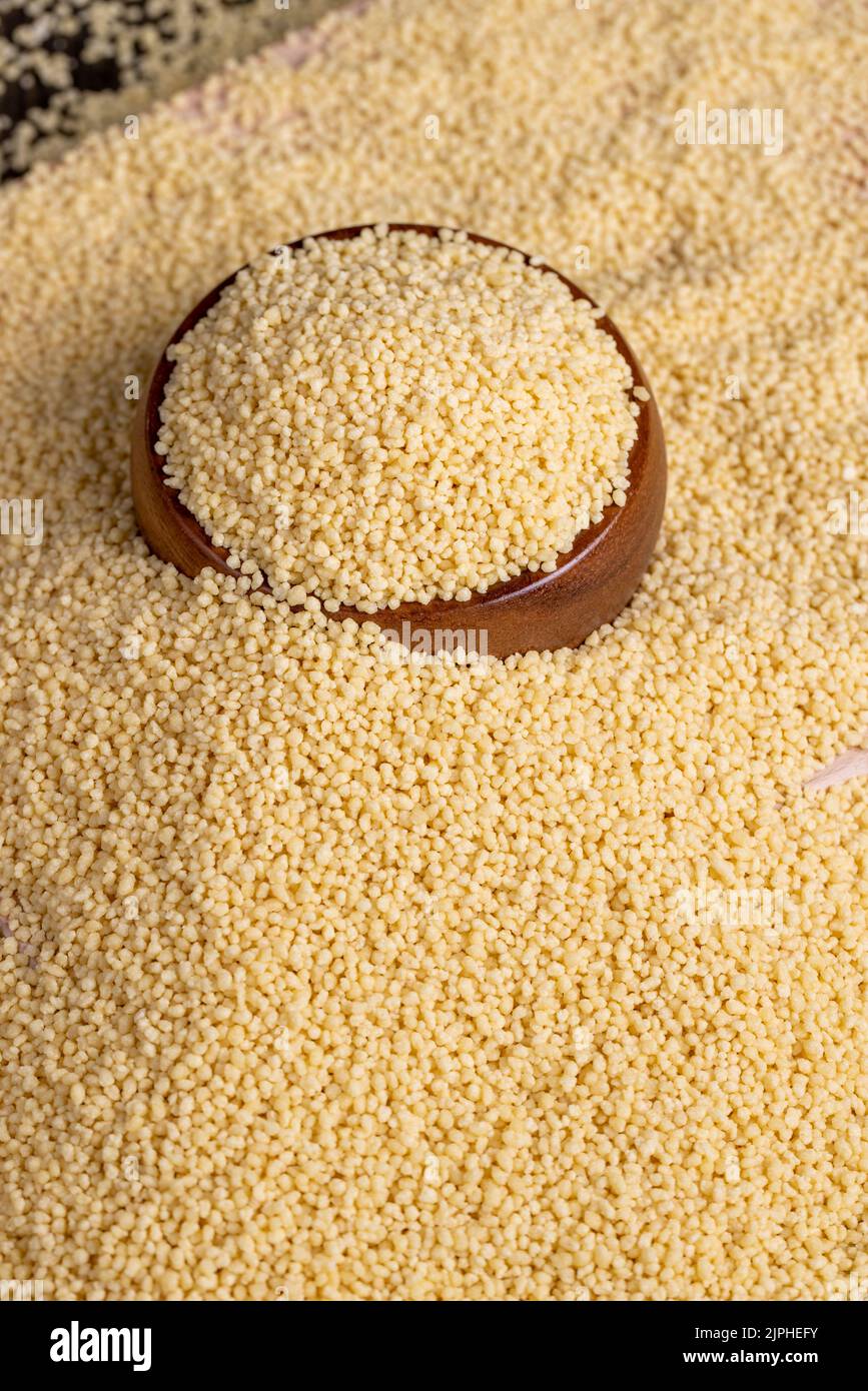 Fresh raw porridge couscous from wheat or millet, cooking dishes from traditional cereals of