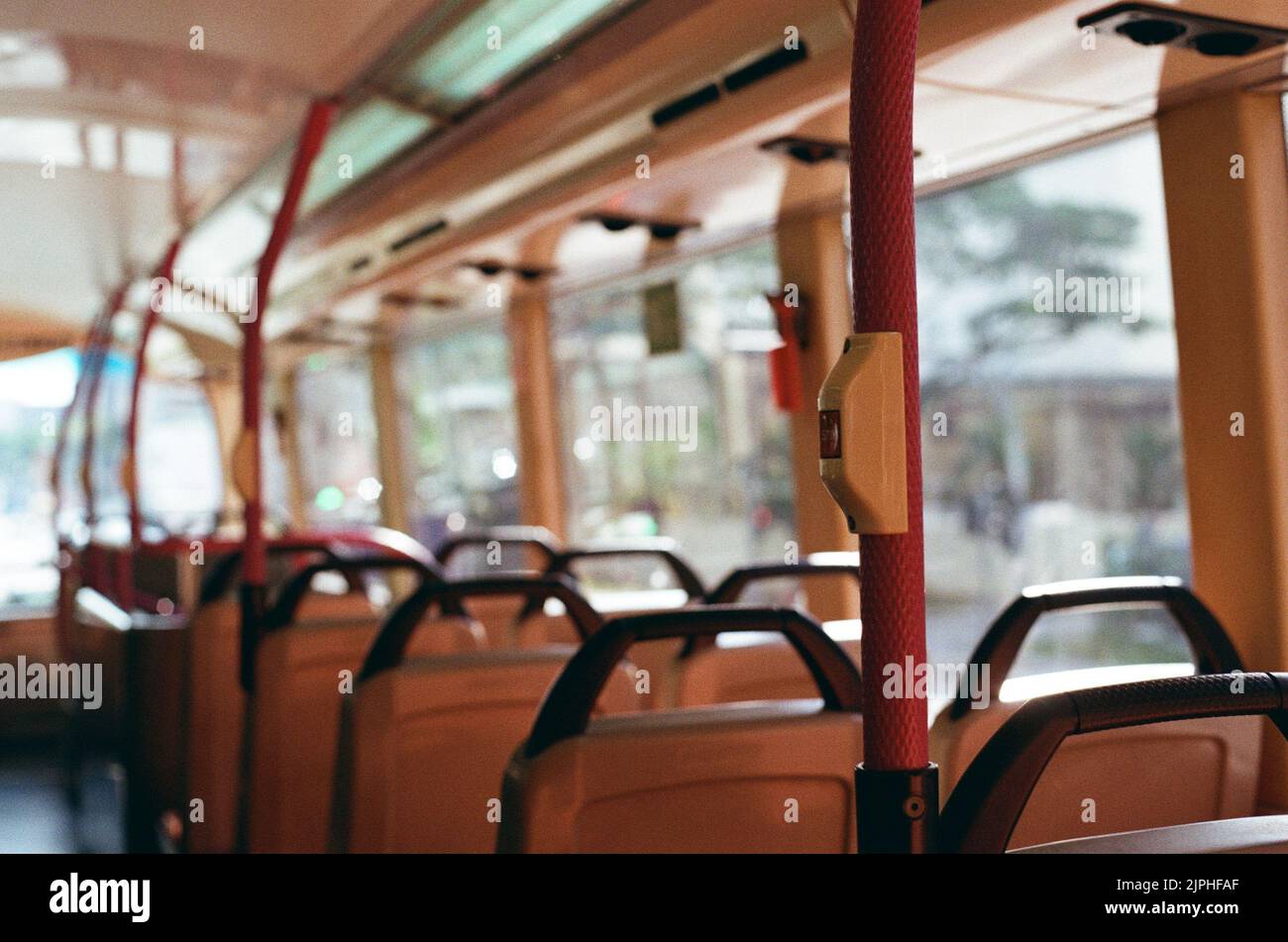 A closeup of a stop button in a bus Stock Photo - Alamy