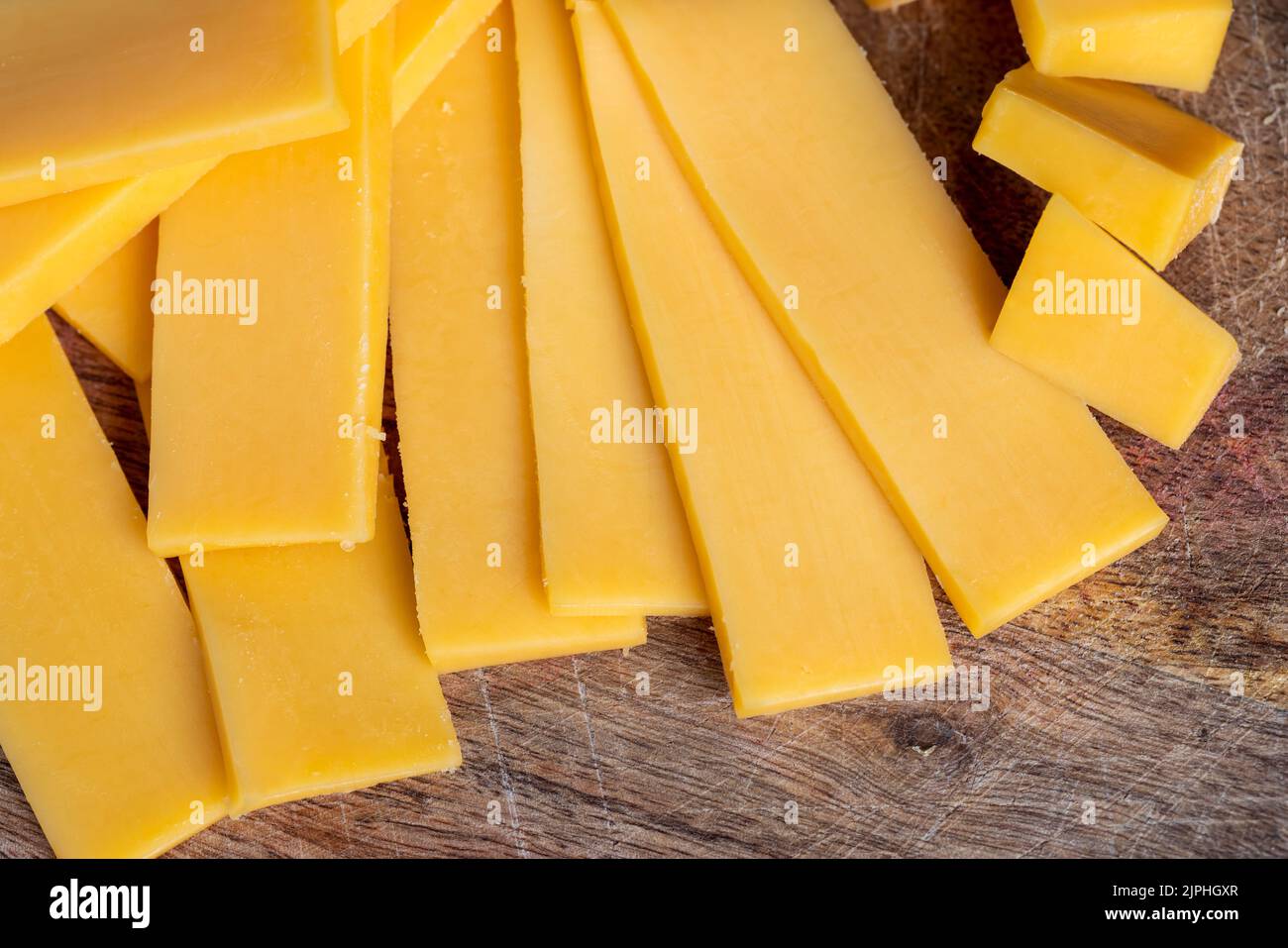 Sliced yellow cheese made from cow's milk, solid quality yellow cheese