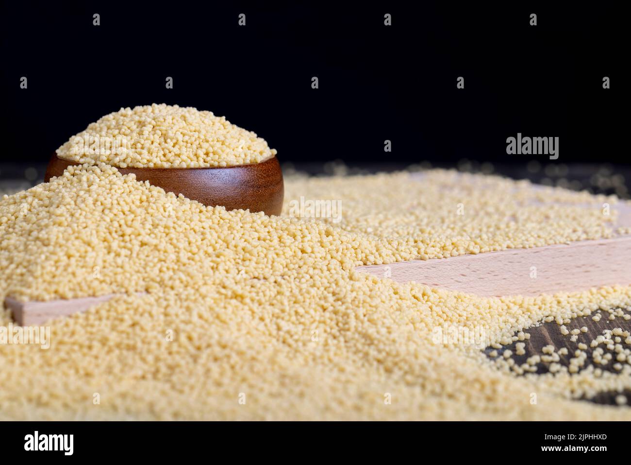 Fresh raw porridge couscous from wheat or millet, cooking dishes from traditional cereals of