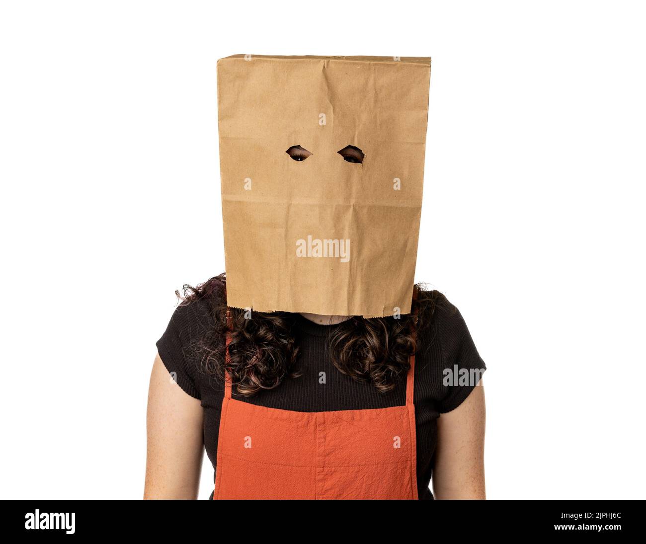 Young woman wearing paper bag over her head Stock Photo