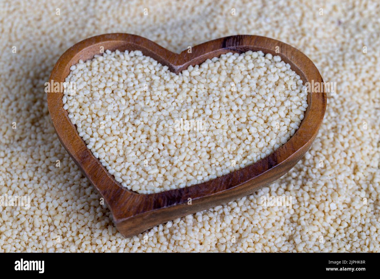 Fresh raw porridge couscous from wheat or millet, cooking dishes from traditional cereals of