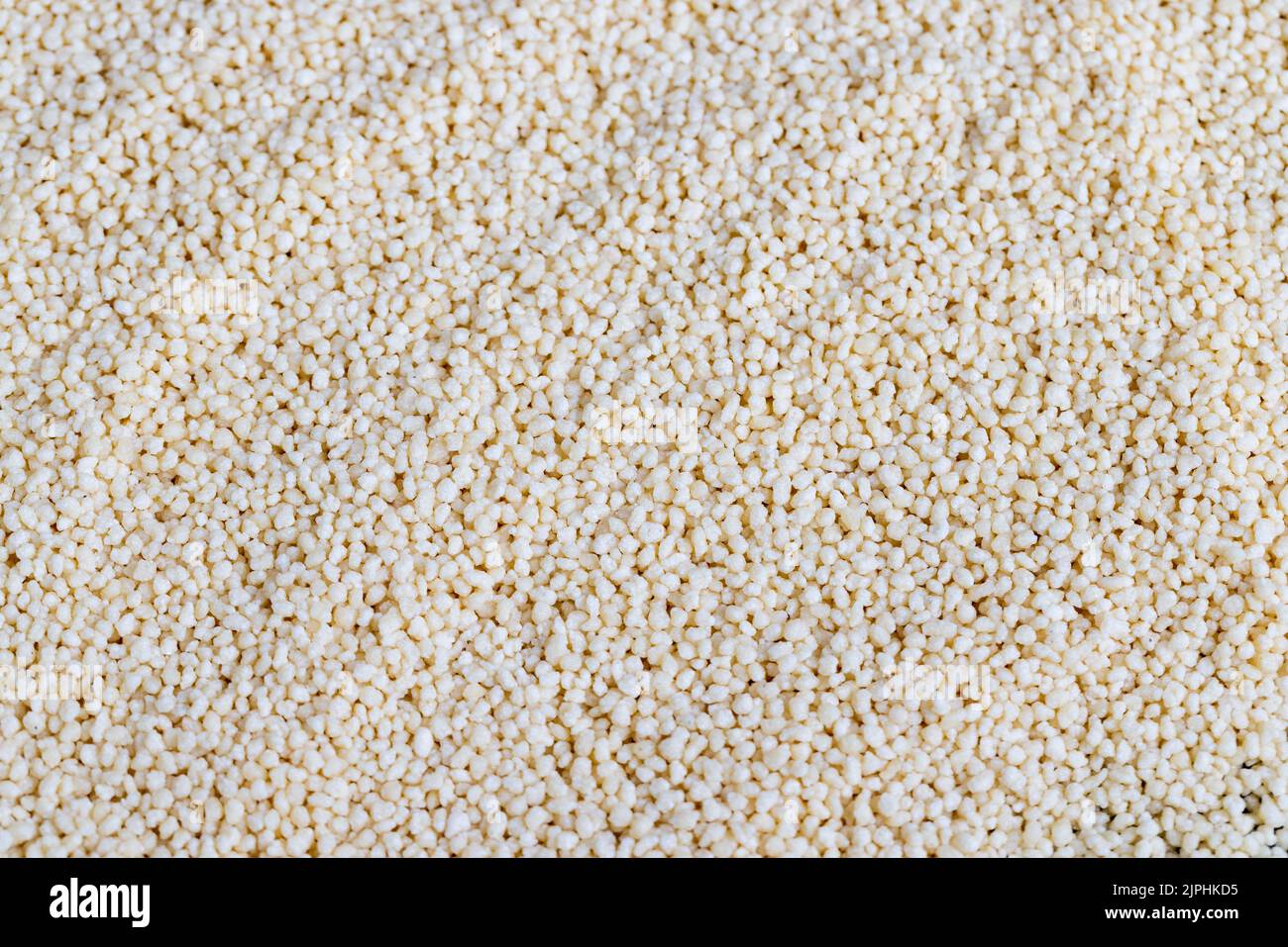 Fresh raw porridge couscous from wheat or millet, cooking dishes from traditional cereals of