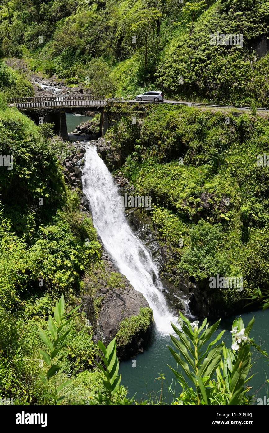 Road to Hana waterfall, with car, mile 21, Maui, Hawaii Stock Photo