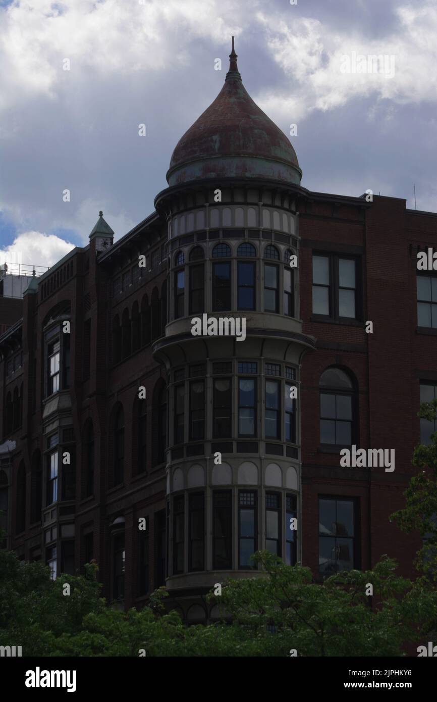 An Apartment Building with a domed tower corner in the Downtown Providence Rhode Island Area Stock Photo