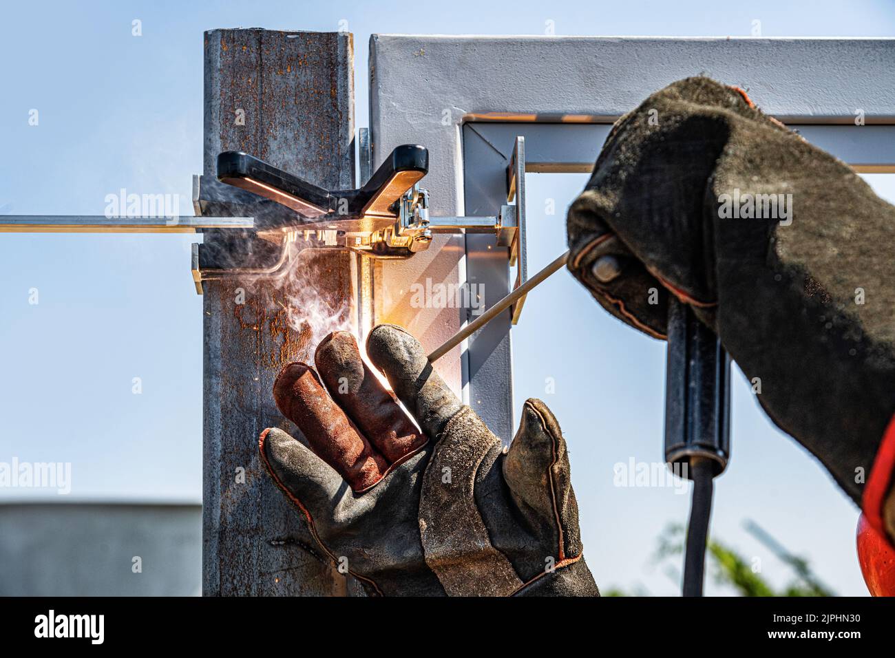 The work of a welder with metal structures Stock Photo Alamy