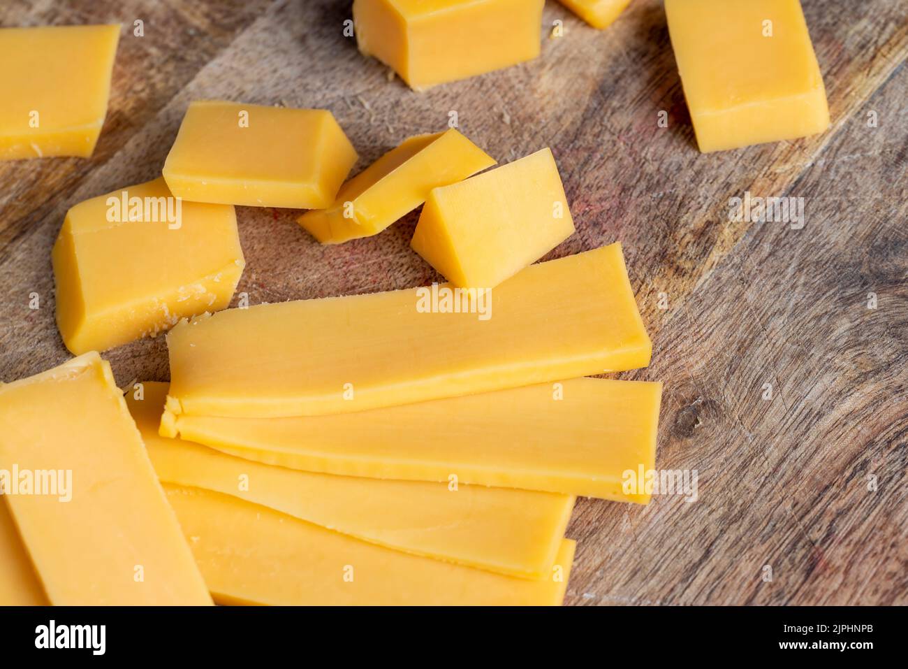 Sliced yellow cheese made from cow's milk, solid quality yellow cheese