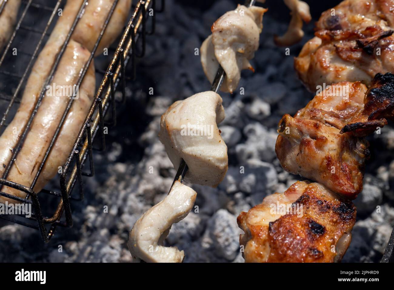 A fire made of logs while cooking barbecue on vacation at the weekend