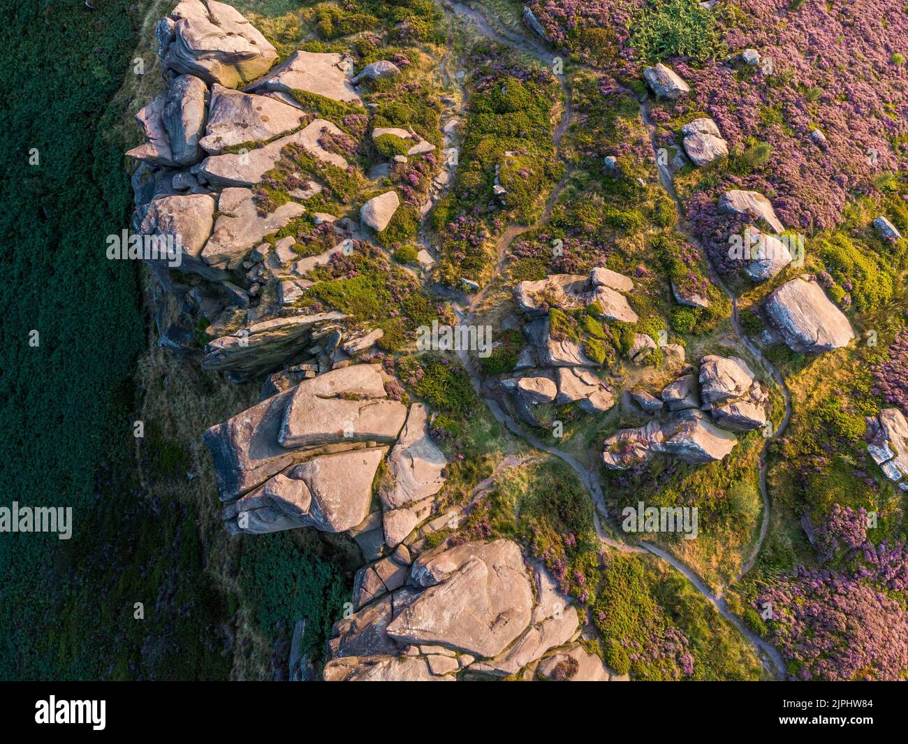 Look from the air on blooming heather on the cliff, Peak District, UK Stock Photo