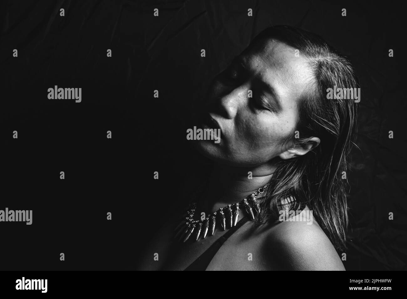 Black and white close-up image of an Indonesian woman Stock Photo