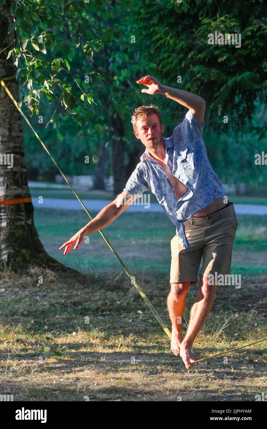 Slackline walker, John Hendry Park, Vancouver, British Columbia, Canada