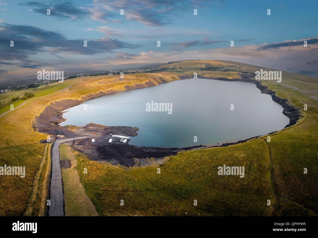 East Pit lake situated between the villages of Tairgwaith, Brynamman and Cwmllynfell in South Wales UK Stock Photo