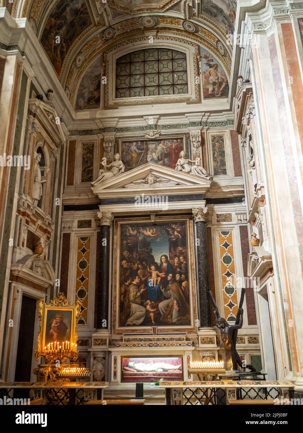 Madonna col Bambino e Santi Martiri by Giovanni Bernardo Azzolino at the Santi Martiri Chapel, Gesú Nuovo Church, Naples Stock Photo